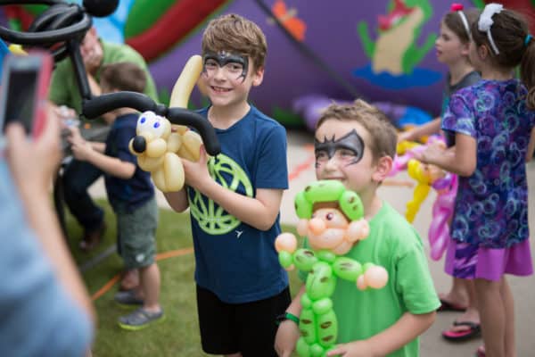 Face painted with balloon animals