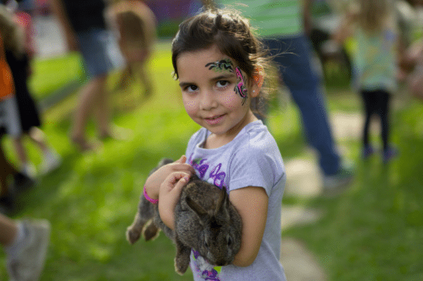 Flower Mound girl at petting zoo