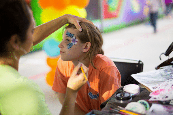 Flower Mound girl getting face painted