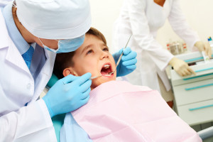 Debra C. Duffy DDS - Dentist Checking Childs Mouth