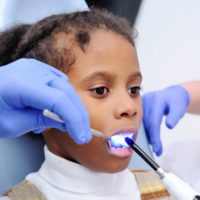 Little girl getting dental filling